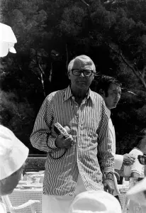 Cary Grant (C) attends the 1976 Cannes Film Festival in Cannes, France, in May 1976. (Photo by Guy Marineau/WWD/Penske Media via Getty Images)