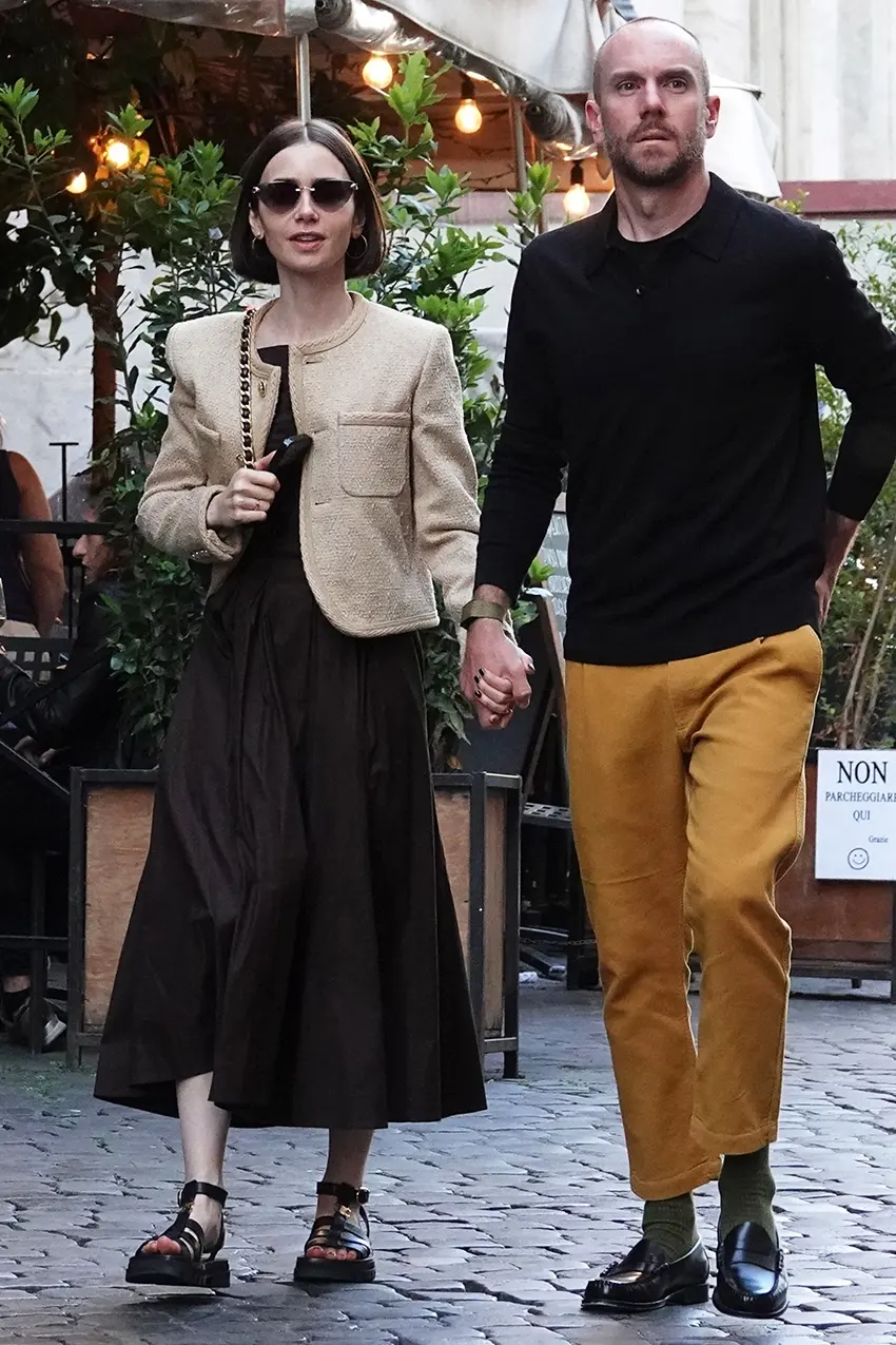 Lily Collins walking with husband in Rome