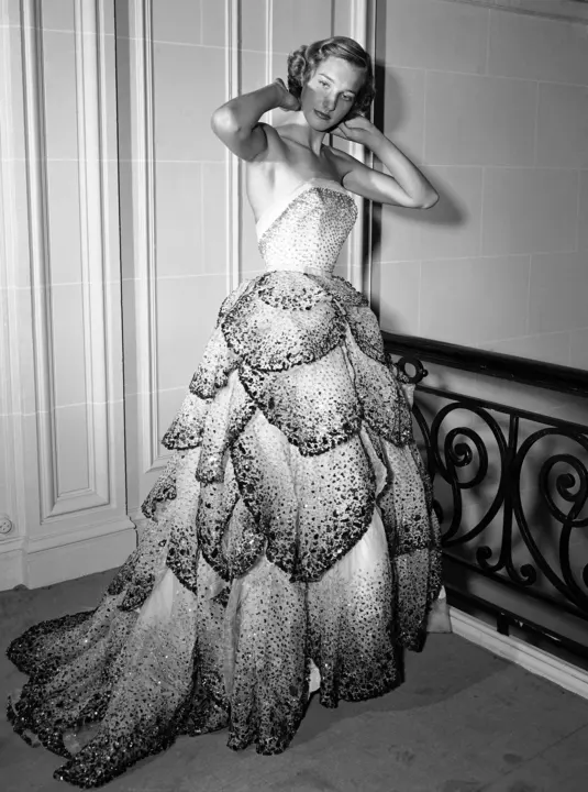 a model wearing a dior juno dress