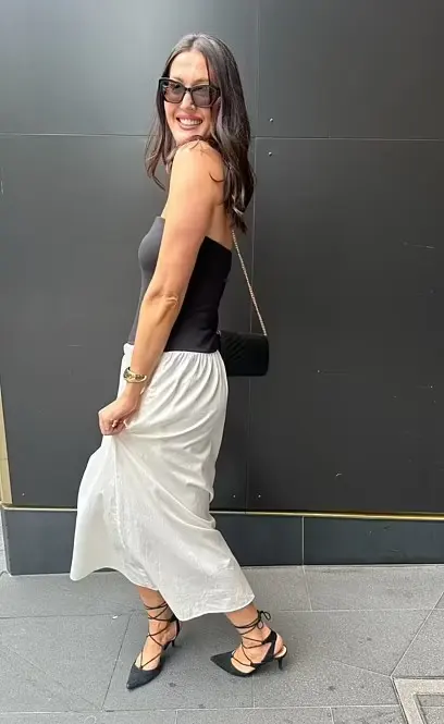 'I ran to Target late last year to nab this Midi Dress because it looked like an exact dupe of the $550 Anna Quan Drop Waist Maxi Dress.'