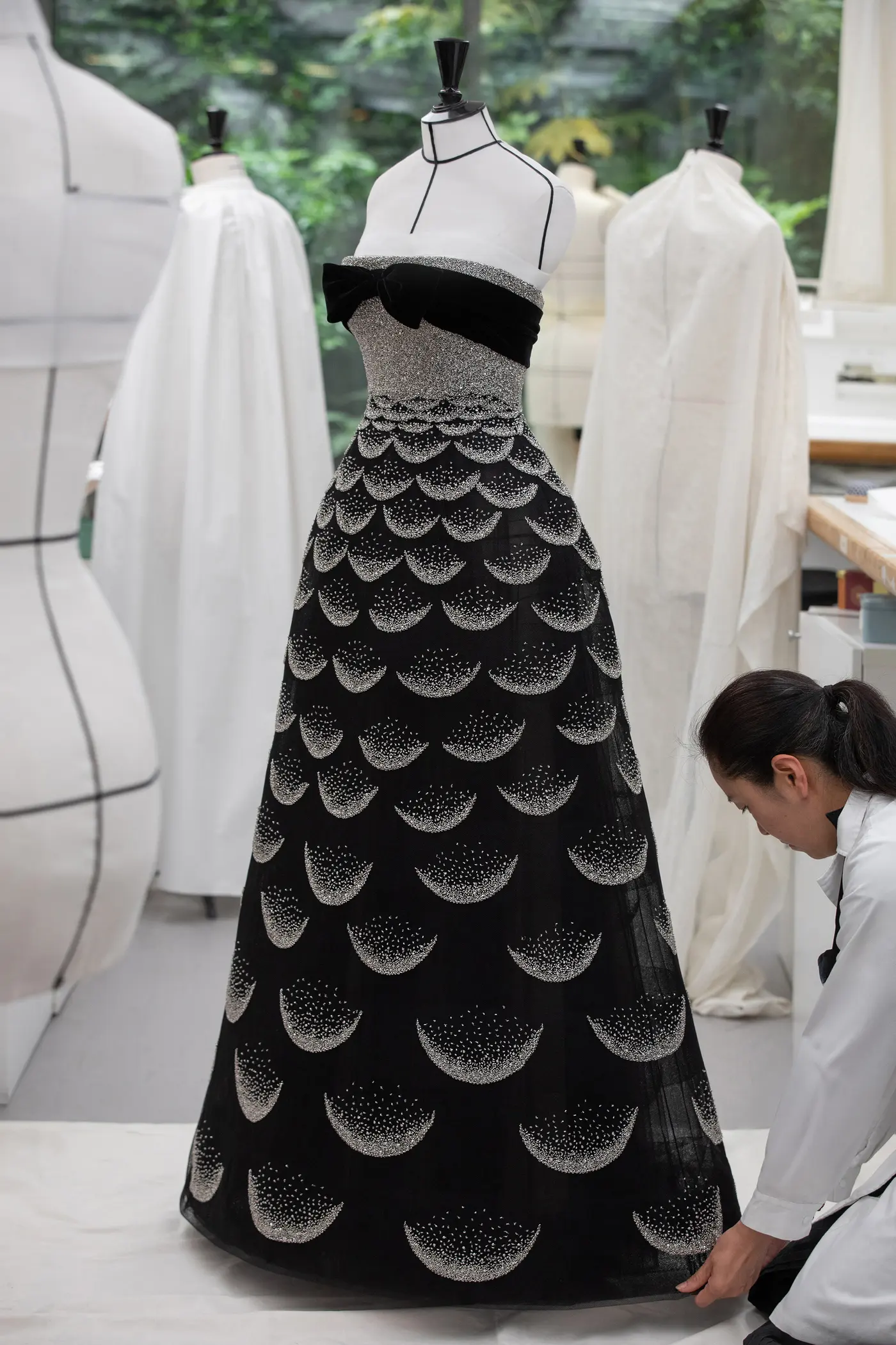 a dior dress on a dress form