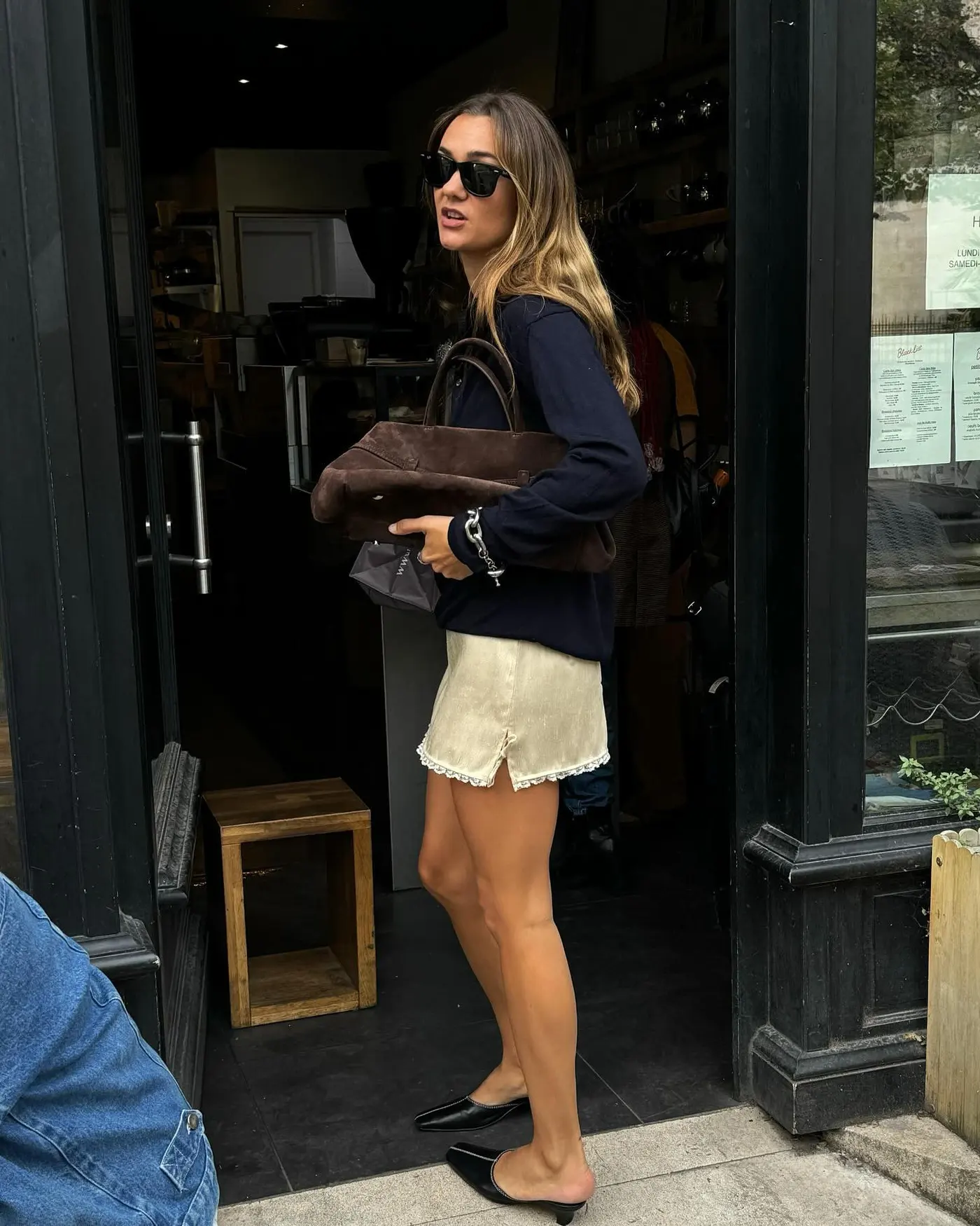 How a French woman styles a slip skirt.