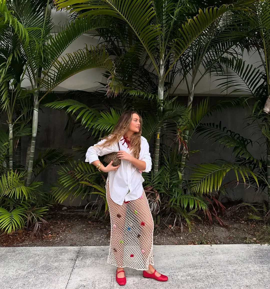 Lauren Cunningham wears fisherman net skirt