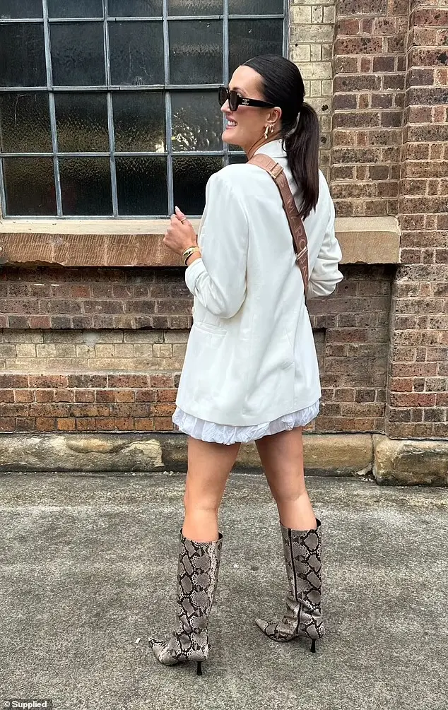 'Amidst the chaos of big sunglasses, exaggerated silhouettes, and borrowed designer looks, it was oddly refreshing to show up in outfits that were truly mine. Styled, bought, and worn with intention,' said Elise. Pictured here wearing a Target dress and blazer that she already had in her wardrobe