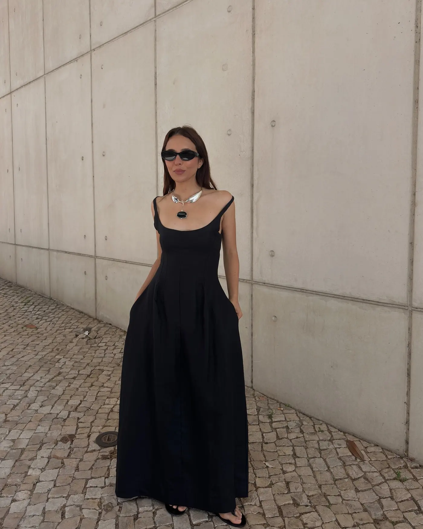 woman wears minimalist dress