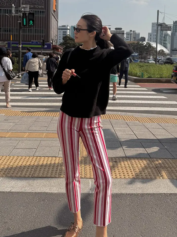 Woman wearing a High Sport pants outfit.