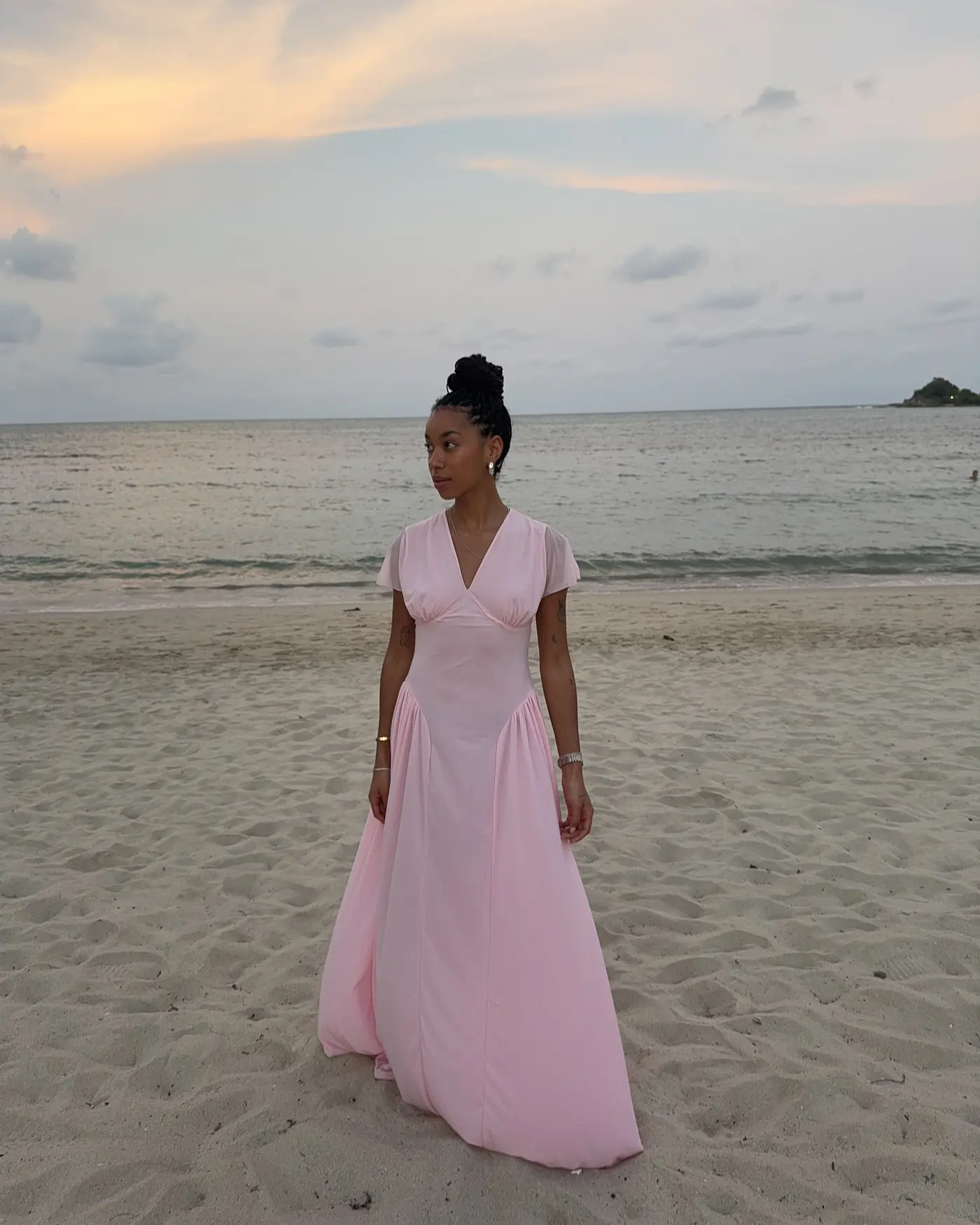 woman wears pastel dress trend