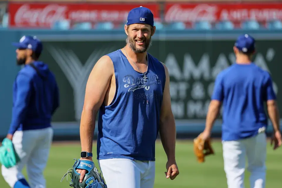 Kershaw warms up in the outfield on Tuesday. (Robert Gauthier/Los Angeles Times via Getty Images)