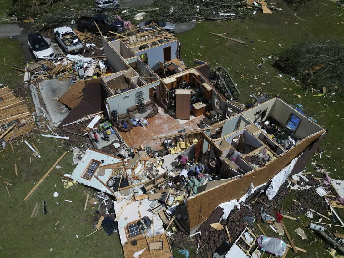 A home is destroyed after a severe storm passed the area in London, Ky., on Saturday.