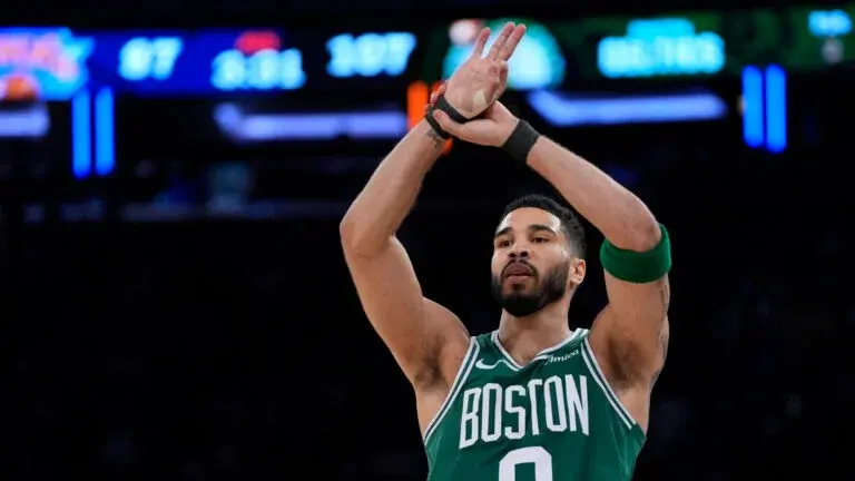 Boston Celtics' Jayson Tatum reacts after scoring a 3-point basket during the second half of Game 3 of an NBA basketball second-round playoff series against the New York Knicks, Saturday, May 10, 2025, in New York.