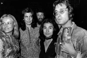 French actress Jeanne Moreau, author Susan Sontag, artist Yoko Ono, musician John Lennon and guest arrive at the 1971 Cannes Film Festival.