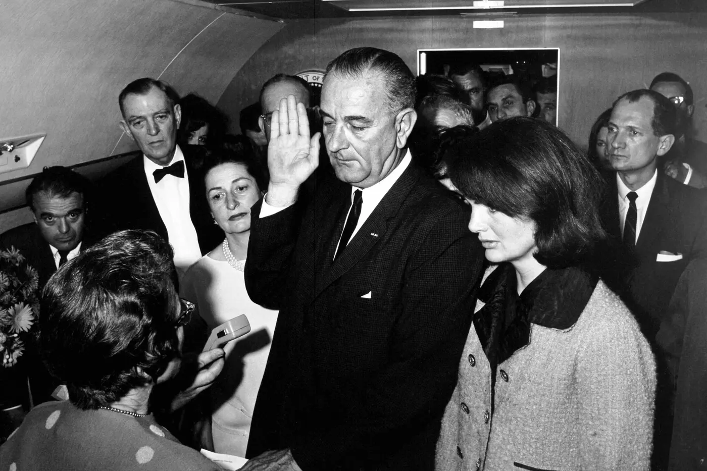 President Lyndon B Johnson takes the oath of office aboard Air Force One at Love Field in Dallas, Texas, hours after the assassination of President John F. Kennedy