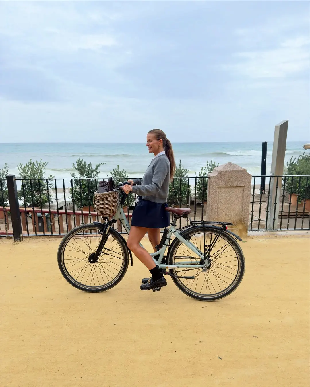 JANKA POLLIANI wears micro mini skirt on bike