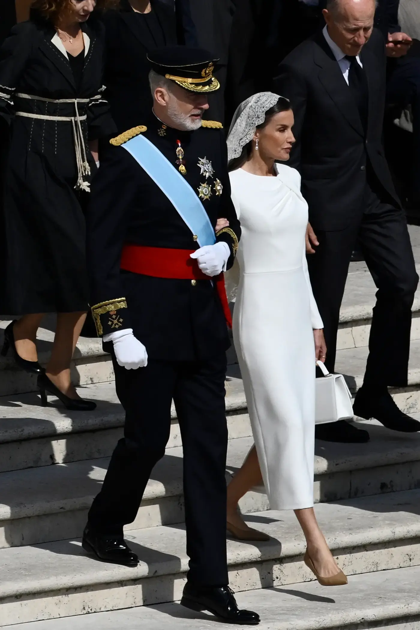 Image may contain John Zaffis Andrzej Pieczyński Cindy Crawford Person Clothing Glove Adult Footwear and High Heel