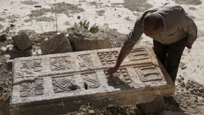 Contractor in Syria discovers unexpected ancient burial site hidden under debris.