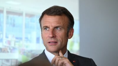 French President Macron calls on Iran to free detained French citizens and expresses worry about its nuclear program.
