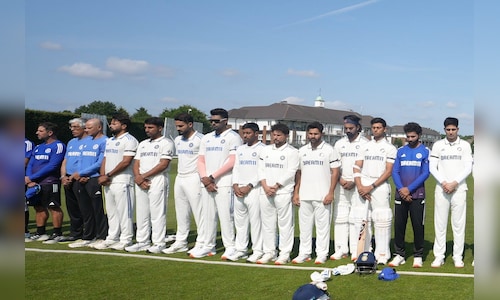 Team India honors Ahmedabad plane crash victims with black armbands and a moment of silence.