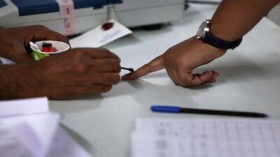 Understanding Bihar's Mobile E-Voting System and Its Users