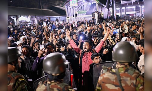 India restarts visa services in Dhaka, halts operations at two other centers due to protests.