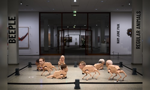 AI Art Exhibition in Berlin Features Robot Dogs and AI-Powered Portraits of Musk and Zuckerberg