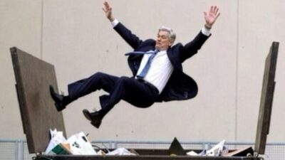 Donald Trump posts AI-generated image of Fed Chair Jerome Powell in a dumpster, criticizes elevated interest rates.