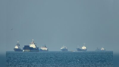 Iran positions 'prepared-for-action' stealth submarines in the Strait of Hormuz as tensions escalate.