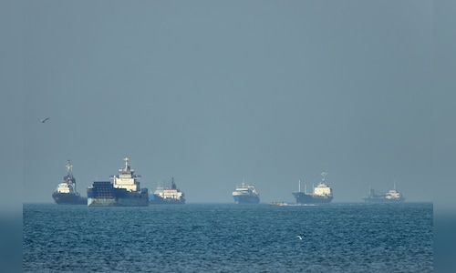 Iran positions 'prepared-for-action' stealth submarines in the Strait of Hormuz as tensions escalate.