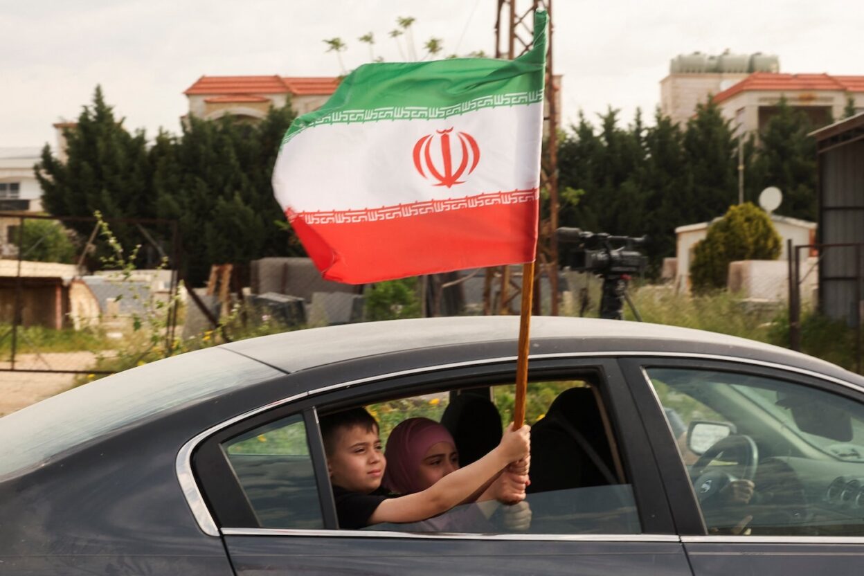 Iranian air defense raises alert in certain areas of Tehran.