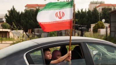 Iranian air defense raises alert in certain areas of Tehran.