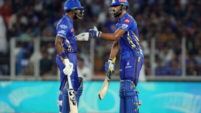 MI choose to field first after winning the toss.