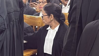 Mamata Banerjee shows up in attorney attire at Calcutta High Court for violence case.