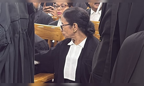 Mamata Banerjee shows up in attorney attire at Calcutta High Court for violence case.