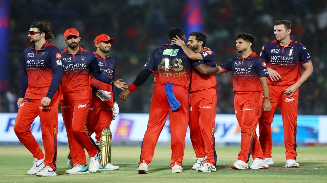 RCB wins the coin toss and chooses to bowl first.