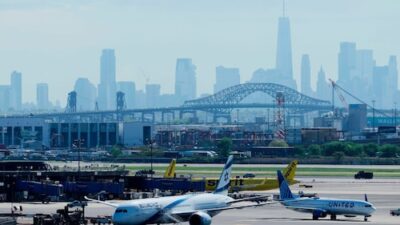 United Airlines Flight 169 from Venice collides with a light pole and truck on the New Jersey Turnpike before landing safely at Newark Liberty International Airport.