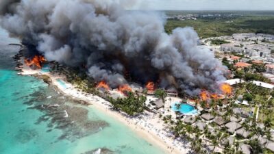 Fire at Dominican Republic beach hotel claims woman's life and prompts evacuation of 1,700 guests.