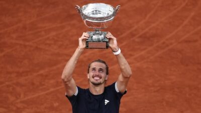 Zverev battles Cobolli to secure his first Grand Slam title at the French Open.