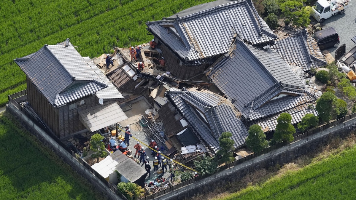 Japan Earthquake Claims 13 Lives; Mall Blast Traps Many, With Aftershocks Anticipated.