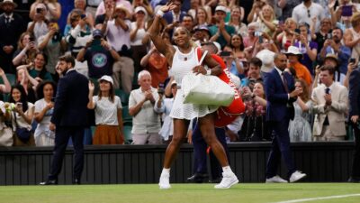 Serena Williams pulls out of doubles match with sister Venus at Wimbledon because of injury.